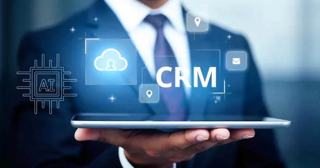 Businessman holding tablet with AI-powered CRM interface icons including cloud, email, and location